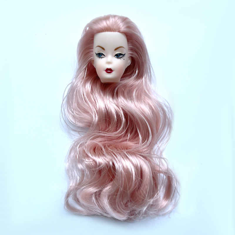 Blaue Augen, gewellte Locken,  – Vintage Fashion Dolls Bewertung und Preis